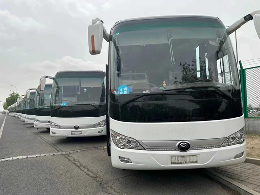 Bus Mewah Bekas Warna Putih 50 Kursi Daun Musim Semi 2018 Tahun Pintu Tengah Mesin Langka 2nd Hand Yutong Bus ZK6119