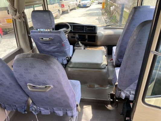 Bus Mini Toyota Coaster Bekas tahun 2011 tahun 2011 Bus Pintu Dioperasikan Manual Diesel Bekas Bus Mewah Bekas dengan 23 Kursi