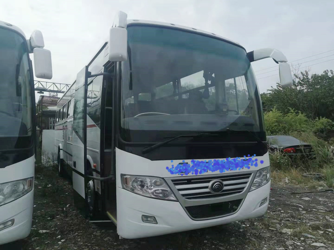 RHD / LHD Digunakan Coach Bus 2+3layout 60seats Dengan Suspensi Pegas Plat Bumper Yutong ZK6112D