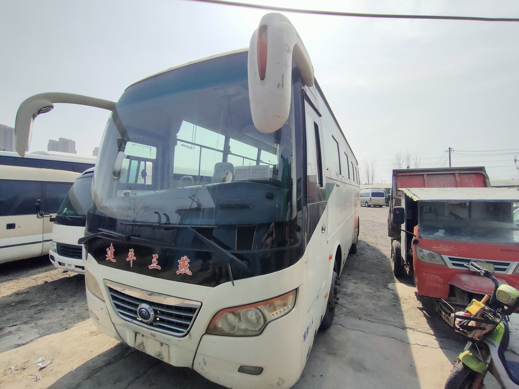 Bus Pelatih Bekas MINI Van 43seater Penggerak Tangan Kanan Suspensi Pegas Daun Yutong Dengan Kondisi Udara