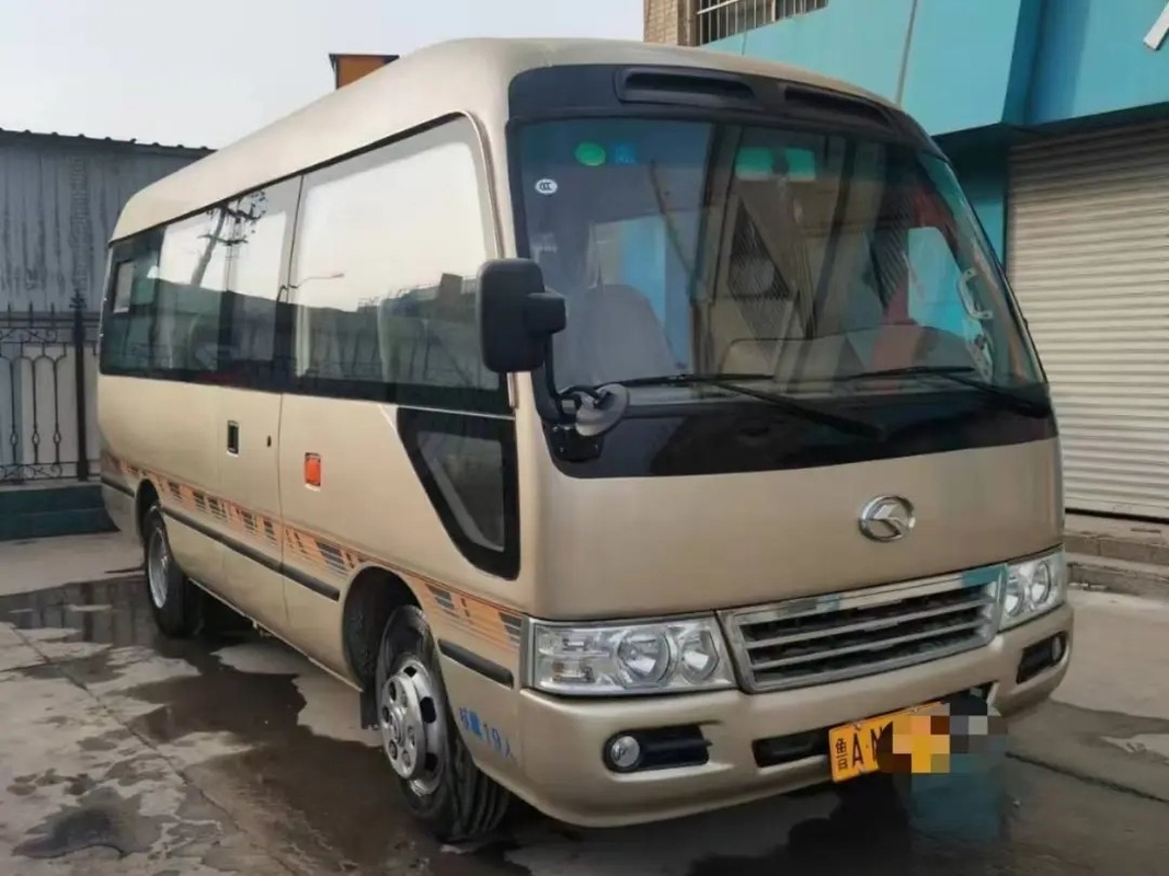 Second Hand 17 Seater Minibus 19 Kursi Mesin Depan Digunakan Kinglong Coaster XMQ6606 Pintu Ayun Eksternal
