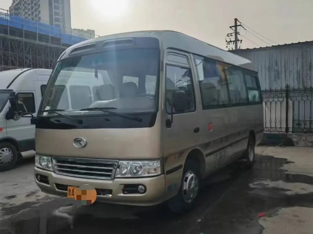 Second Hand 17 Seater Minibus 19 Kursi Mesin Depan Digunakan Kinglong Coaster XMQ6606 Pintu Ayun Eksternal