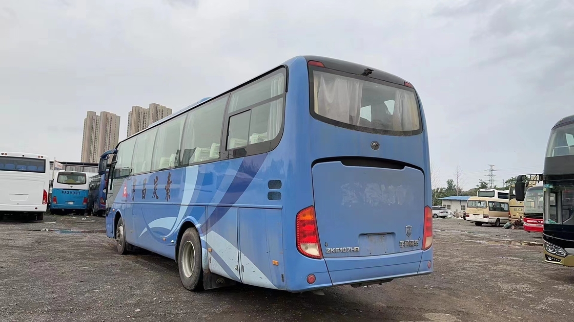 Mikrobus Bekas 60 Kursi 2 + 3 Tata Letak Kursi Mesin Yuchai AC Warna Biru Digunakan Bus Tong Muda ZK6107