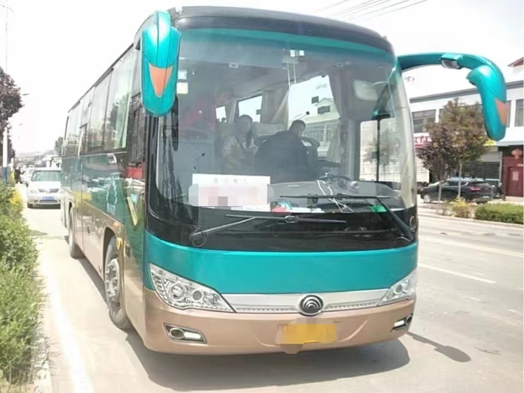 Pelatih Motor Bekas Warna Hijau 36 Kursi AC Pintu Penumpang Tengah 2nd Hand Yutong Bus ZK6906