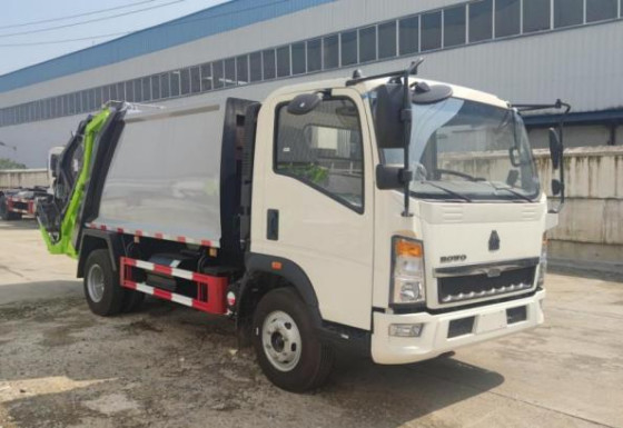 Pedagang Truk Kendaraan Komersial 8m³ Memuat 4×2 Mode Berkendara HOWO Truk Sampah Terkompresi Panjang 7,5 Meter
