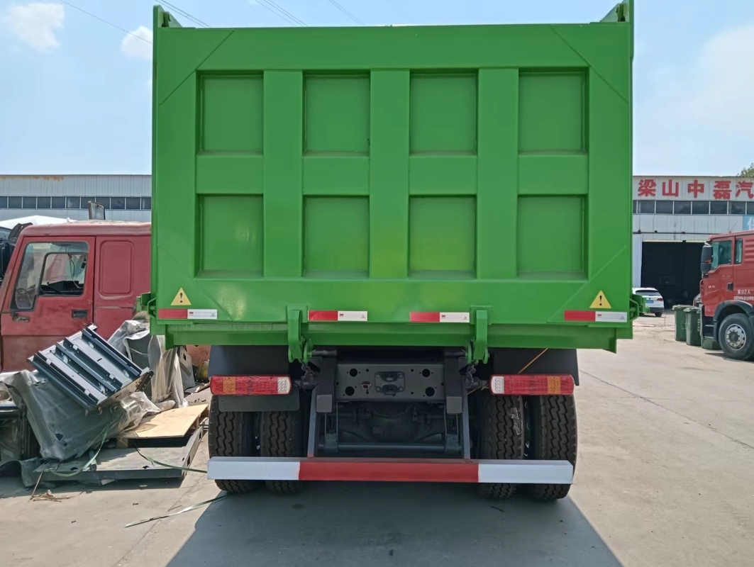 Truk Dumper yang Digunakan di Zimbabwe Sinotruk Howo Leaf Spring 30CBM Box Hand Drive