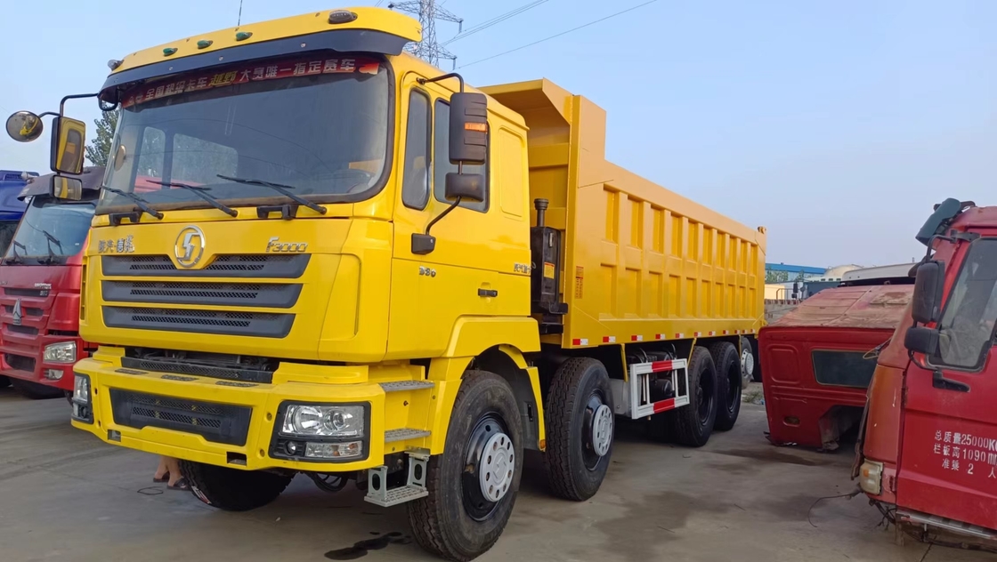 Truk sampah bekas China F3000 Truk pengguling hemat biaya Shacman 12 Ban 8*4 LHD Weichai 380hp
