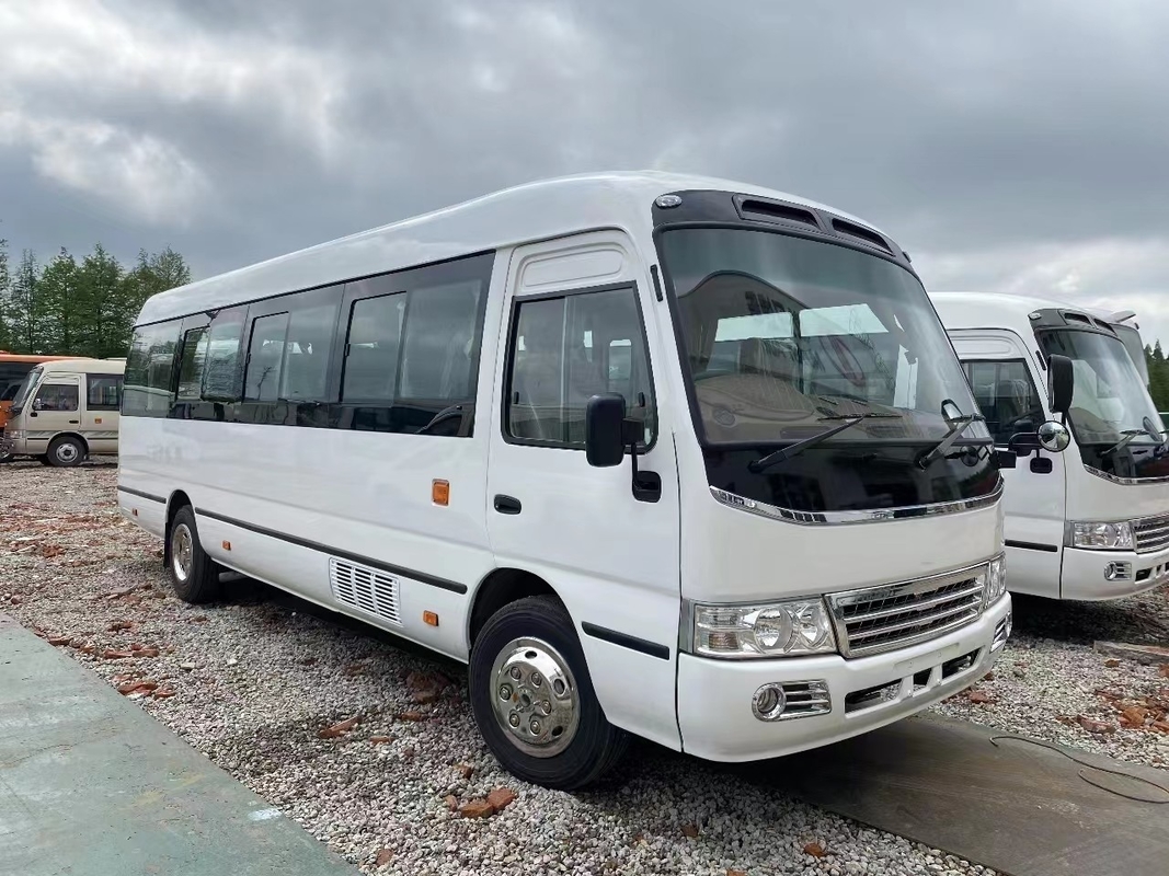 Bus Minibus Mudan 30 Seater Pengemudi Tangan Kanan Penggunaan Di Tanzania Leaf Spring Untuk Jalan yang Buruk