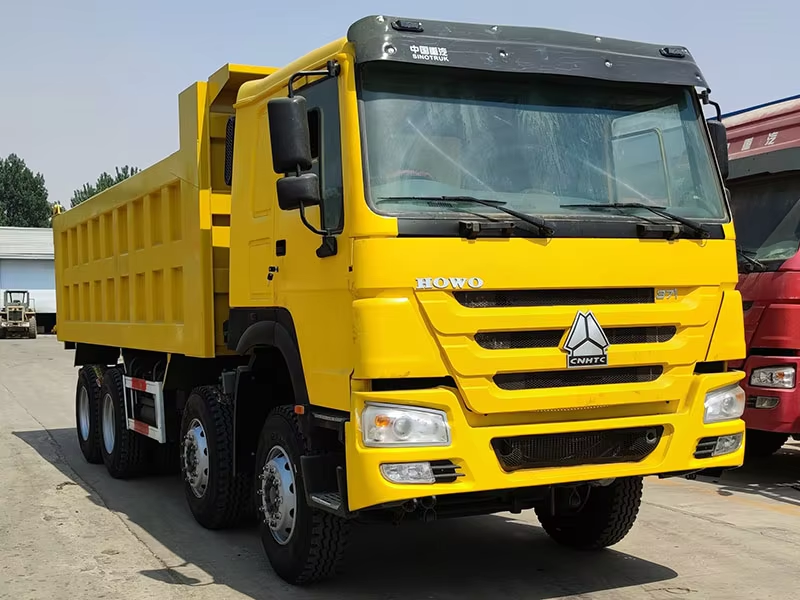 Howo Dump Truck Bekas 371hp 8x4 Penggerak Tangan Kiri Mesin Diesel WP AC 12 Roda untuk Zimbabwe