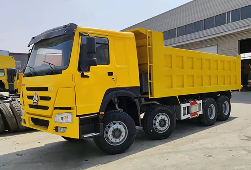 Howo Dump Truck Bekas 371hp 8x4 Penggerak Tangan Kiri Mesin Diesel WP AC 12 Roda untuk Zimbabwe
