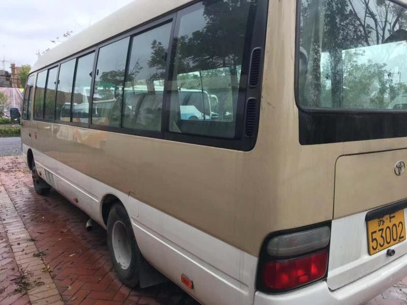 Tahun 2010 Toyota Coaster Menggunakan Bus 23 Kursi Mesin Diesel 15B Tinggi Bus 2585mm