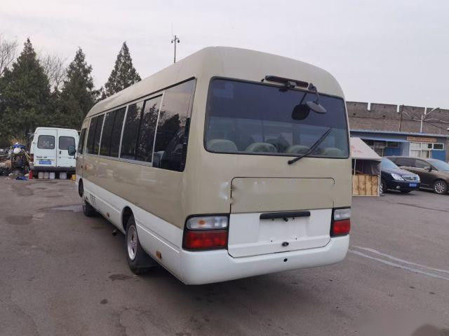 Toyota Bus Coaster 20 Kursi Bensin Drive Tangan Kiri Bekas Bus Penumpang Kilometer Rendah