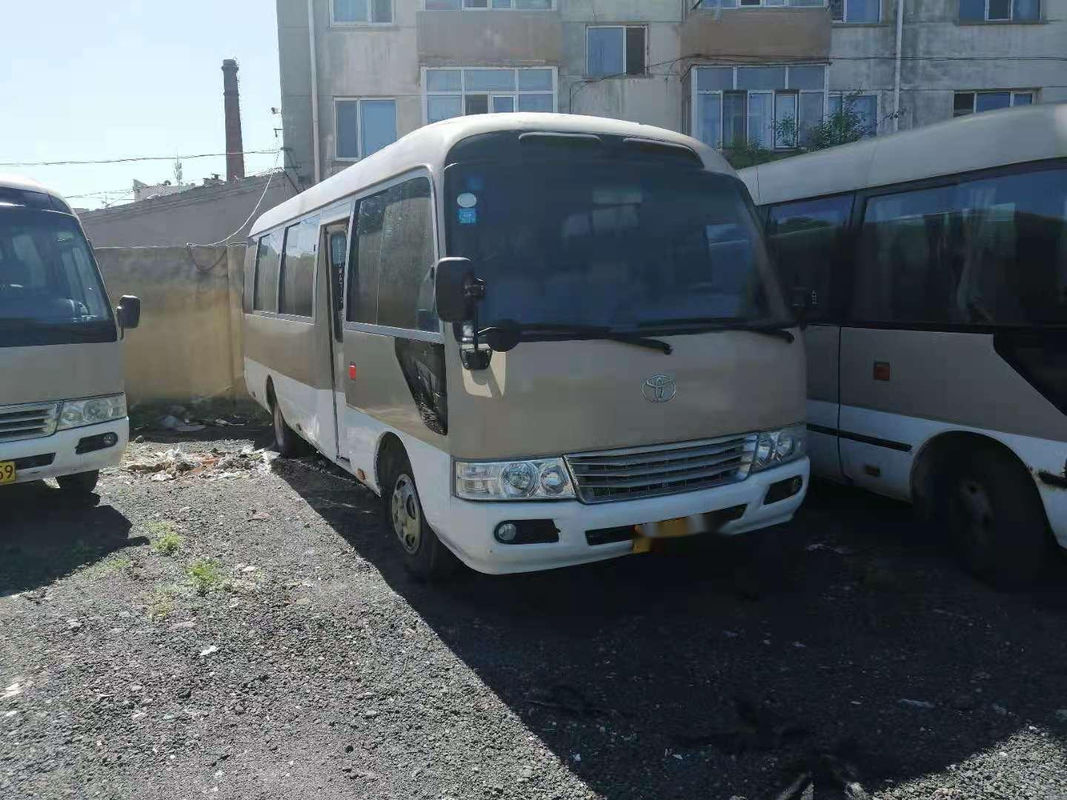 Mesin Diesel 1HZ 23-29 kursi Drive Tangan Kiri Kilometer Rendah Bus Penumpang Bekas Bus Coaster Bekas Coaster Merek Jepang