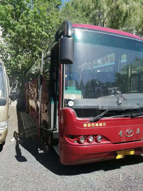 Bus Pemuda Bekas NEOPLAN Chassis 48 kursi Airbag Pintu Ganda Kemudi Kiri Mesin Belakang Bus Penumpang Bekas