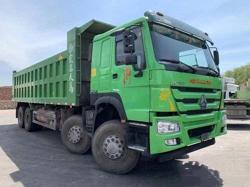 China Second Hand Sinotruk HOWO 7 Truk Berat 380 Tenaga Kuda 8X4 8.2m Truk Dumper ZZ3317N4667E1
