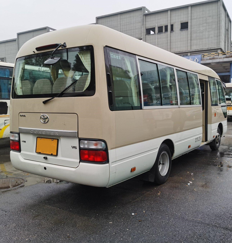 LHD Second Hand Coaster Bus Hino Engine 23 Seater Khaki Bus Dengan Sistem A/C Mewah