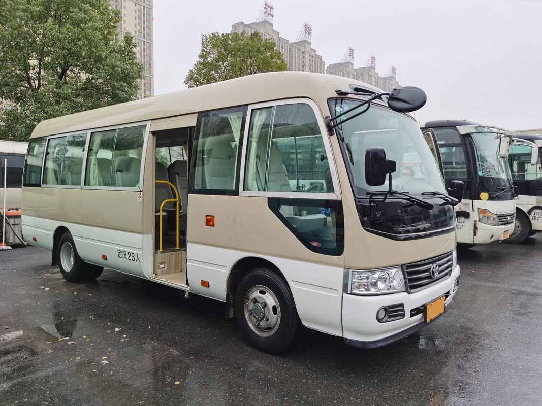 LHD Second Hand Coaster Bus Hino Engine 23 Seater Khaki Bus Dengan Sistem A/C Mewah