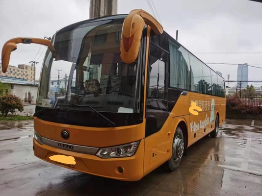 RHD/LHD Digunakan Coach Yutong 60seats 2+3layout Dua Pintu Mesin Yuchai Belakang